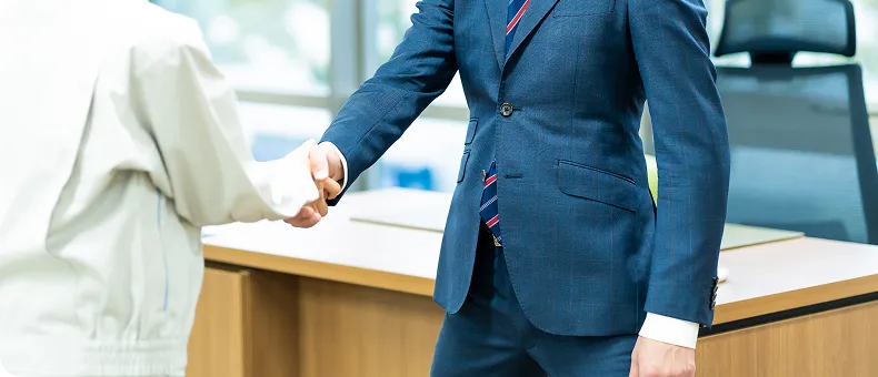 専門家との握手